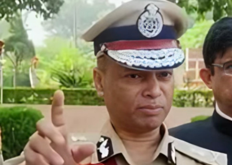 O. P. Singh in uniform, addressing the press